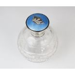 A George V cut glass, silver and enamel scent bottle, marks for Finnigans Ltd, London 1925, of