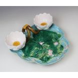 A George Jones majolica strawberry dish, late 19th century, modelled as a lily pad on ozier ground