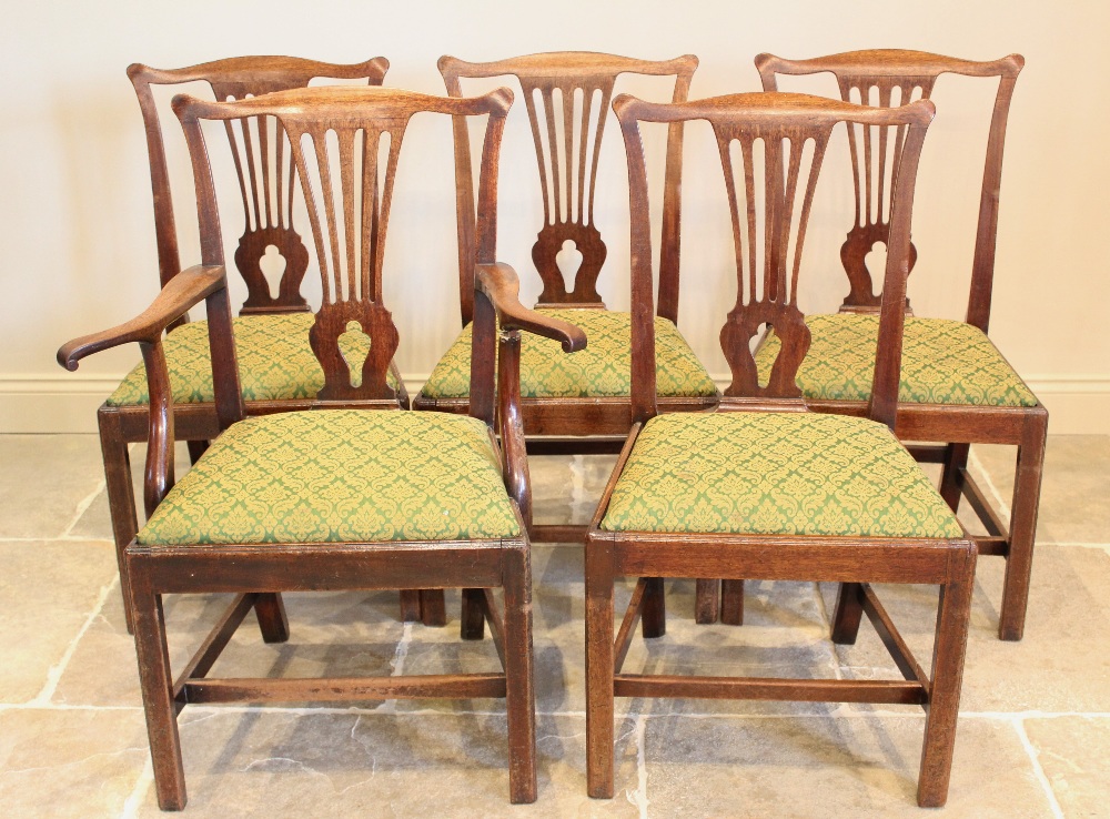 A set of seven George III mahogany Hepplewhite style dining chairs, each chair with a pierced - Image 2 of 3