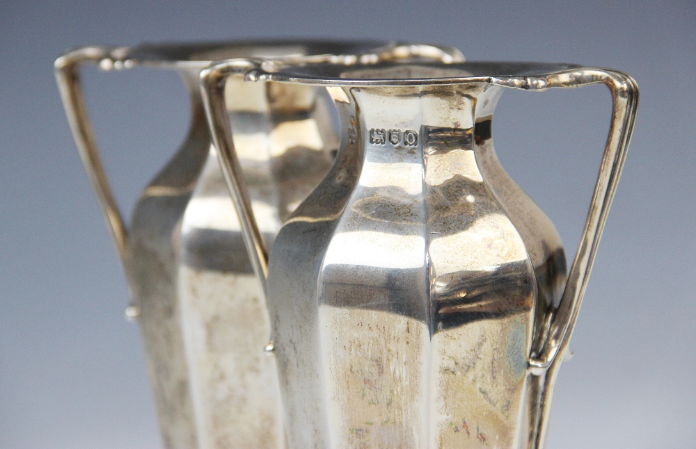 A pair of Edwardian silver twin-handled vases by Goldsmiths & Silversmiths Company, London 1909, - Image 3 of 11