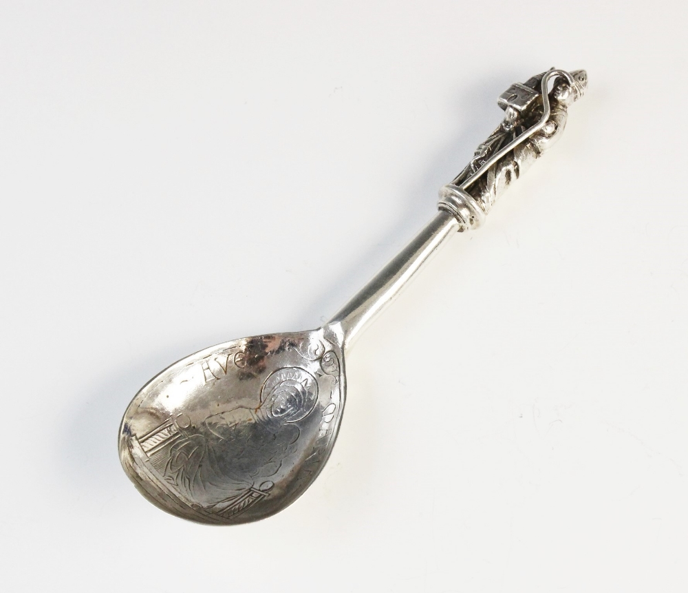 A continental silver spoon, the fig shaped bowl engraved with Mary and Jesus and inscribed 'Ave