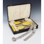 An Art Deco silver mounted and enamelled dressing table set by Beddoes & Co, Birmingham 1935-36,