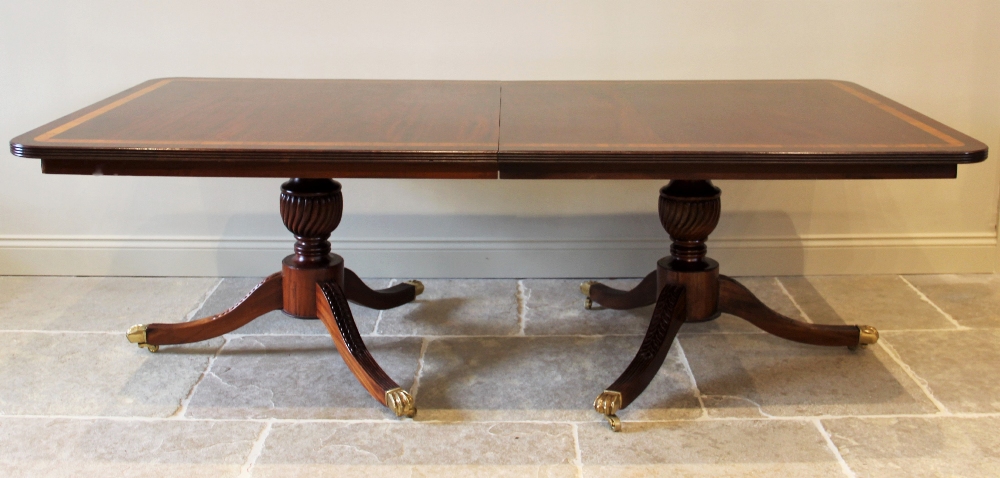 A Regency style twin pillar mahogany dining table, late 20th century, the rectangular satinwood - Image 2 of 6