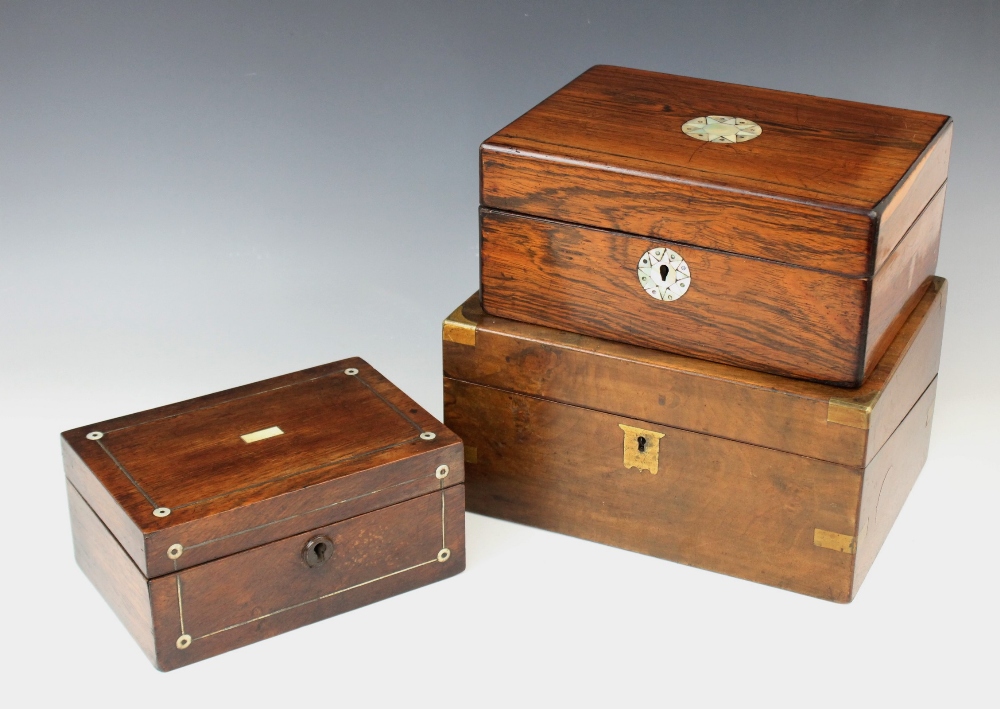 A 19th century rosewood stationery box, the cover centred with an inlaid mother of pearl star