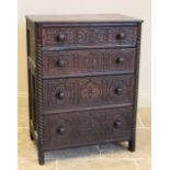 An 18th century style oak chest of drawers, later constructed, formed as four long graduated