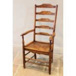 An early 19th century ash and elm ladder back country chair, the five rung back above out swept arms