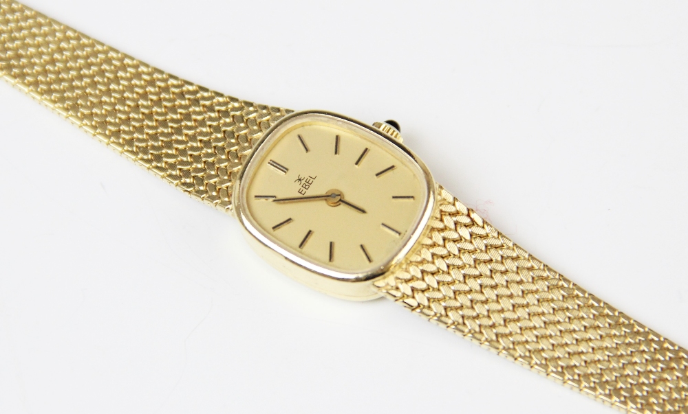 A lady's vintage 18ct gold Ebel wristwatch, the gold-toned dial with black and gold baton markers,