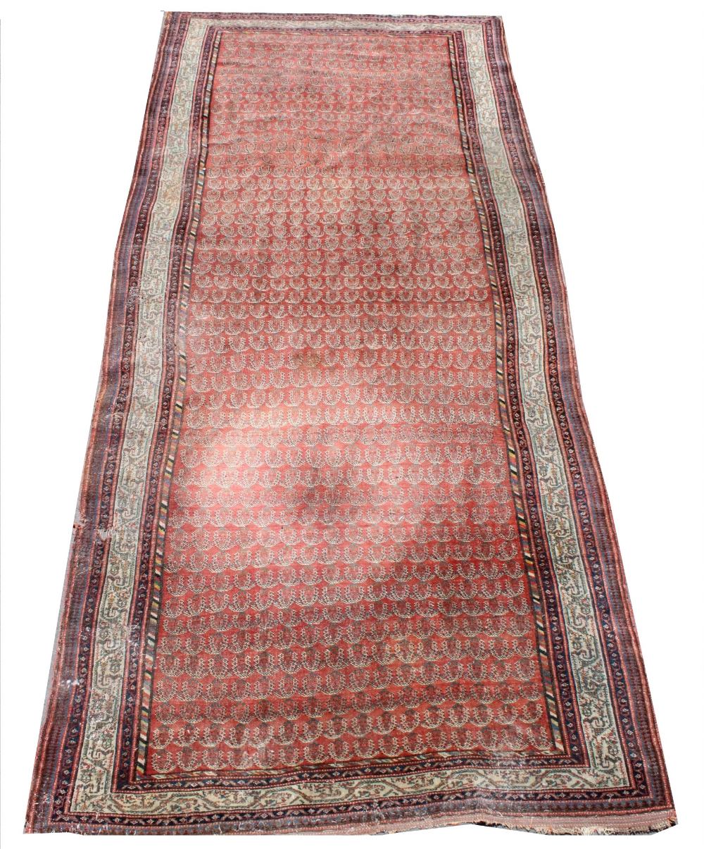 A 19th century Caucasian runner in the Karabagh style, woven in polychrome threads with three