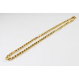 A yellow gold fancy-link chain, with lobster claw fastening stamped '750', 47cm long, weight 29.1gms