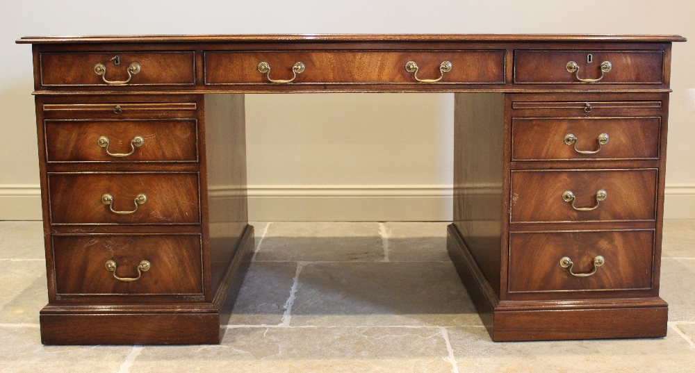 A George III style mahogany twin pedestal desk, late 20th century, the rectangular moulded top - Image 2 of 2