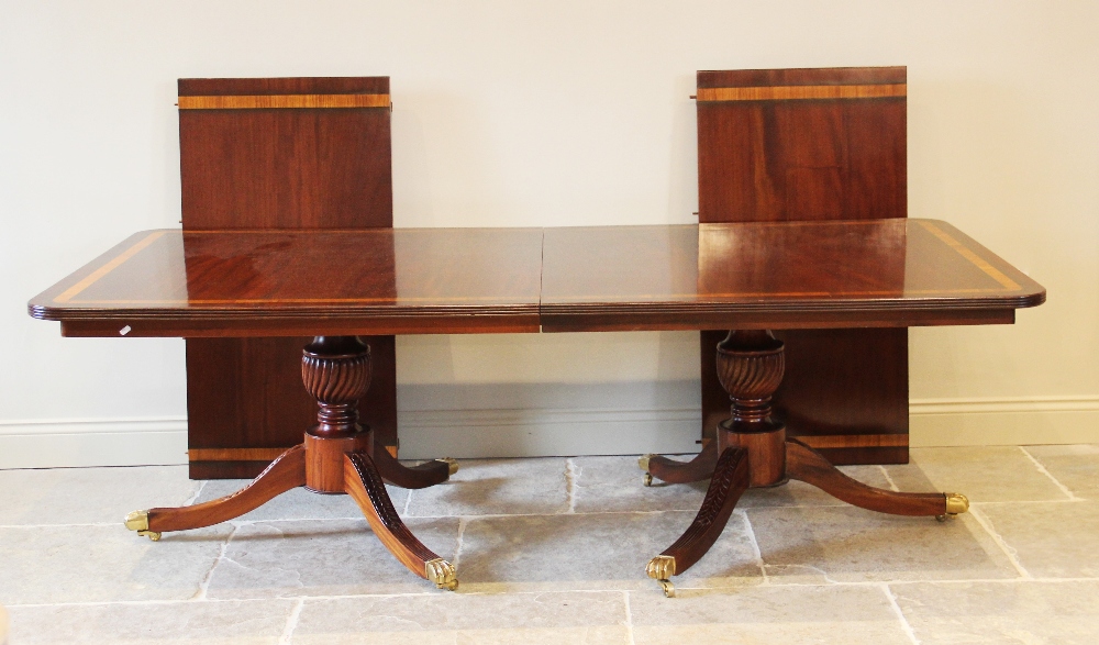 A Regency style twin pillar mahogany dining table, late 20th century, the rectangular satinwood - Image 6 of 6