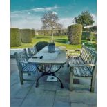 A 19th century sandstone and iron work garden/patio table, the substantial rectangular sandstone