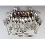 A late 19th/early 20th century thirty-two piece canteen of silver fiddle pattern cutlery by John