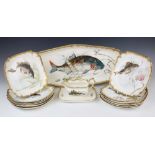 A Franz Anton Mehlem fish service, late 19th century, comprising: a fish platter, a sauce boat and