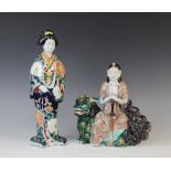 A Japanese Kutani Geisha, 20th century, modelled standing in extensive robes, 34cm high, with a