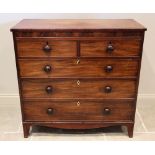 An early 19th century mahogany chest of drawers, the rectangular top, over two short and three