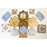 A collection of ceramic tiles to include four Minton tiles in a pagoda design, ten French Felix