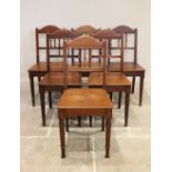 A set of six late 19th century walnut country dining chairs, the rail backs with three turned