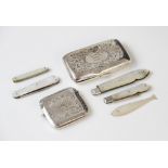 A silver George V vesta case by John Rose, Birmingham 1926, of square form with scrolling engraved