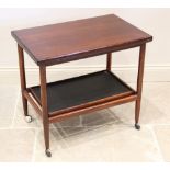 A mid century rosewood drinks trolley, probably Indian, the folding and revolving top tier above a