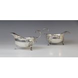 A pair of Victorian silver sauce boats by George Nathan & Ridley Hayes, Birmingham 1893-4, of oval