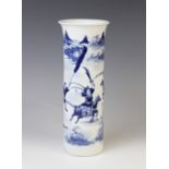 A Chinese porcelain blue and white sleeve vase, 19th century, of cylindrical form with flared rim,