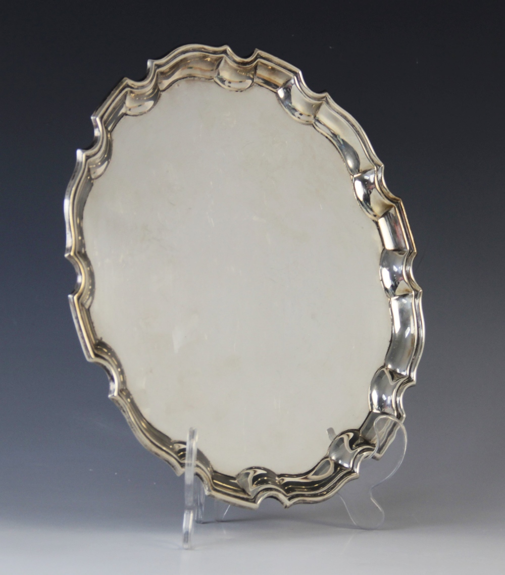 A George VI silver salver by Deakin & Francis, Birmingham 1941, of plain polished circular form with - Image 6 of 6