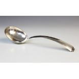 A mid-century Danish 830S silver soup spoon, the oval bowl with tapered handle and stepped terminal,