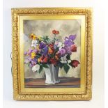 R. Bielle (French school, 20th century), A floral still life in a white vase, Oil on board, Signed