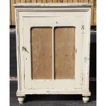 A Victorian painted pine food safe, the single door with replaced board panels, opening to two