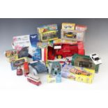 A collection of boxed and un-boxed diecast model vehicles by makers including Corgi, Matchbox