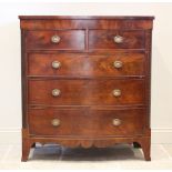 A mid 19th century mahogany bow front chest of drawers, with two short over three long graduated