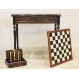 A George III style mahogany games table, late 20th century, the serpentine folding top opening to