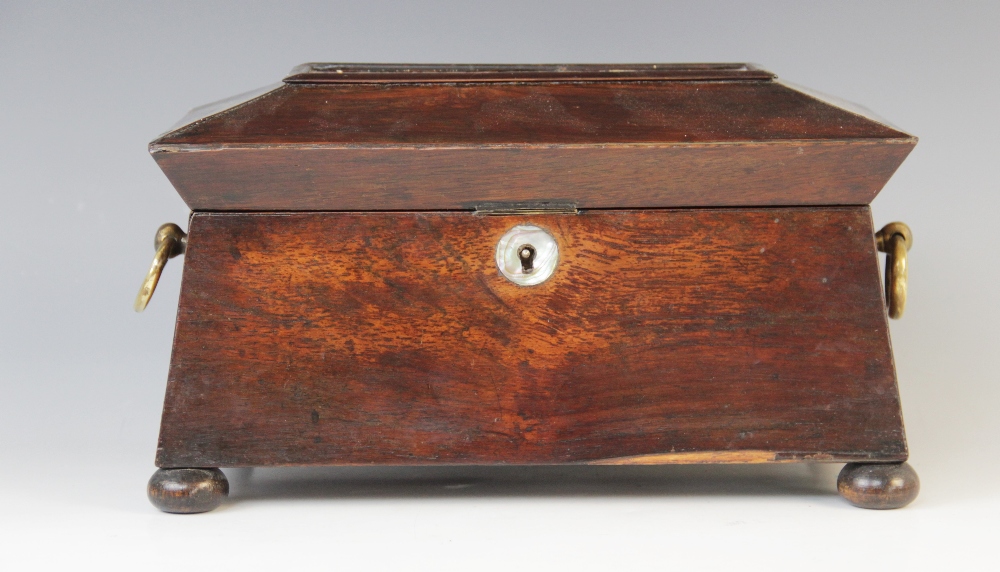 A William IV walnut tea caddy, early 19th century, of sarcophagus form on bun feet with drop ring - Image 2 of 4