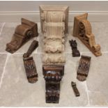 A quantity of carved architectural wall brackets, of typical form in various woods, sizes and