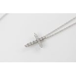 A Tiffany & Co silver cubic zirconia set cross pendant, 20mm x 15mm, set to a silver Tiffany & Co