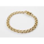 A 14ct gold curb link bracelet, tongue and box snap clasp fastening, Swedish hallmarks to clasp,
