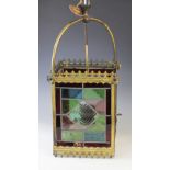 A Victorian stained and leaded glass pendant lantern, the four sides constructed from an arrangement