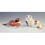 A Royal Crown Derby paperweight modelled as a pheasant, lacking stopper, 18cm long, with a Royal