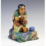 An early Royal Doulton HN1689 'Calumet' figure, printed maker's mark and hand painted model number