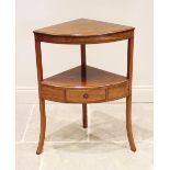 A George III mahogany corner washstand, later converted, the lower shelf with a single frieze