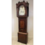 A George IV oak and mahogany eight day longcase clock, the 36cm painted break arch dial with moon