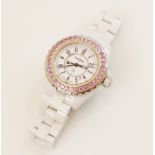 A lady's Chanel 'J12' white ceramic quartz wristwatch, the white dial with Arabic numerals, luminous