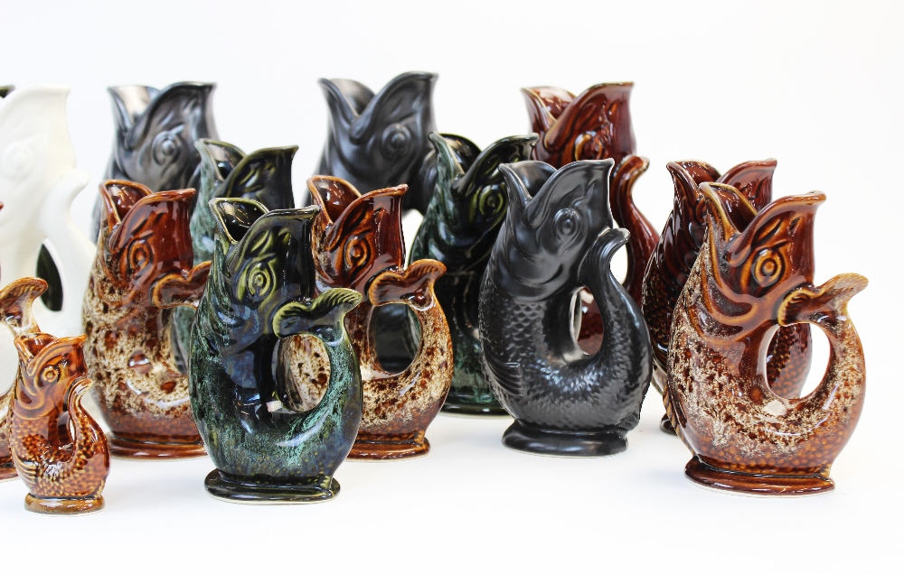 A collection of seven Dartmouth glug jugs of large proportions, each of typical form in various - Image 4 of 4