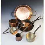 A selection of 19th century and later copper pans comprising; a graduated set of five saucepans, a