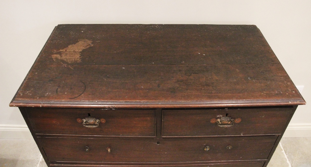 A George III mahogany chest of drawers, the rectangular moulded top above two short and three long - Image 2 of 2
