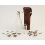 A cut glass white metal mounted hunting flask, of faceted cylindrical form with screw lid, 18cm