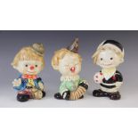 Three Carnival Chalk ware novelty money boxes, 20th century, each modelled as a costumed child,