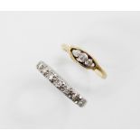 An 18ct gold diamond half-eternity ring, comprising nine round brilliant cut diamonds, (each