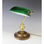 An Art Deco desk lamp, early 20th century, of typical form with brass frame and green shade, 37cm